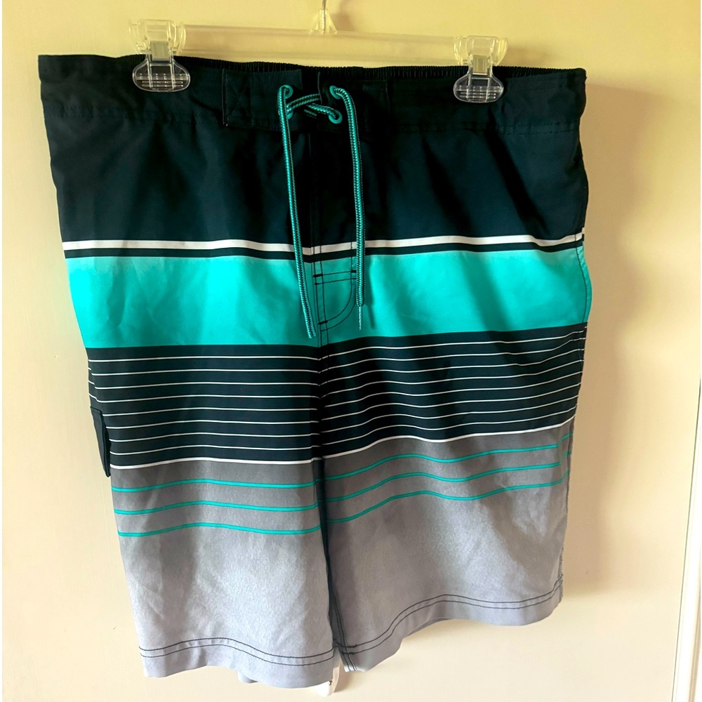 Men’s swim trunks brand is Georges size large 36 to 38